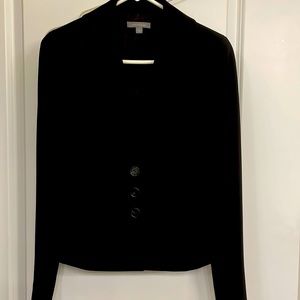 Ann Taylor black blazer 3 button closure and stitching details. Size 2